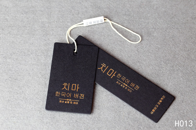 服裝吊牌定做 衣服吊牌現(xiàn)貨 廠家高檔吊卡設(shè)計(jì) 通用爆款銷售領(lǐng)先